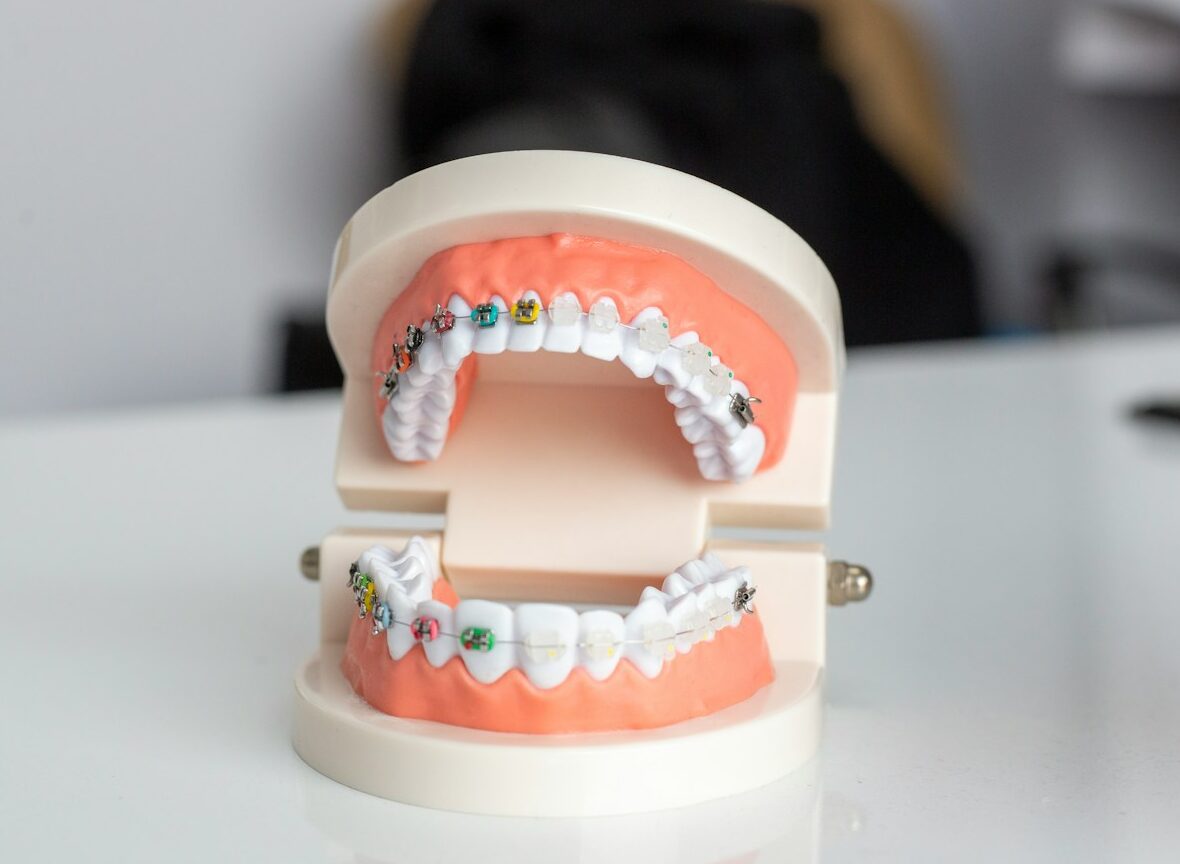 white and brown ceramic cake figurine